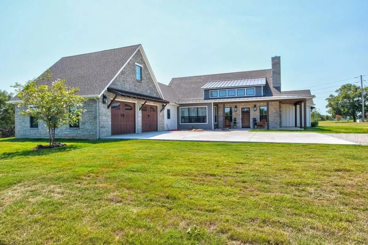 Custom stone farmhouse-style home in Glen Rose Texas built by All Over Solutions